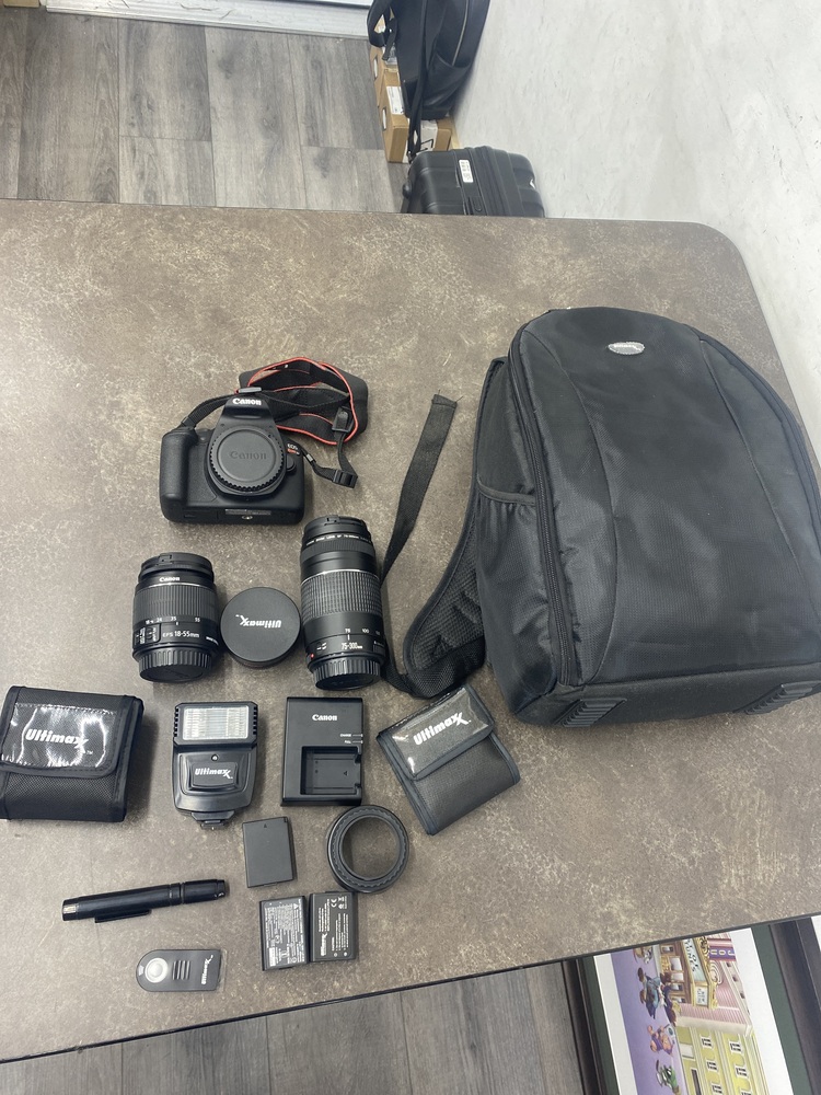 CANON REBEL T7 DIGITAL CAMERA KIT. COMES WITH 3 LENSES, CHARGER, FILTERS, FLASH,