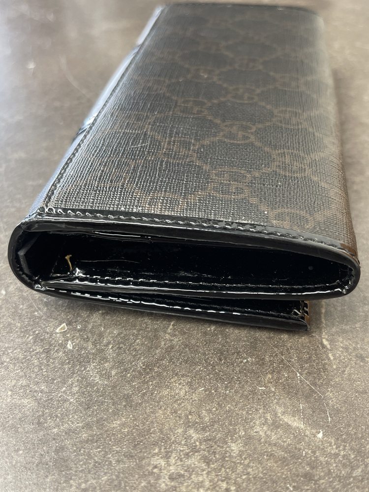 GUCCI LONG WALLET WITH HEART DESIGNS ON THE FRONT FLAP