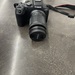 Canon EOS R7 camera with an 18-150mm lens