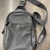 Coach Men's Black Pebbled Leather Sling Backpack